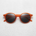 Frame: Amber / Brown Tortoiseshell Lens: Dark Brown